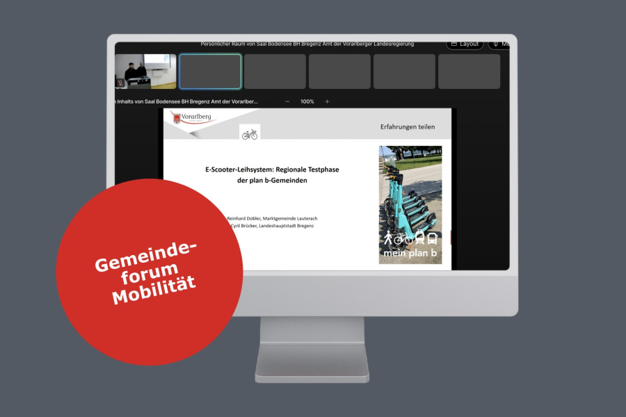 Symbolfoto mit Computer auf dem die Präsentation "läuft"